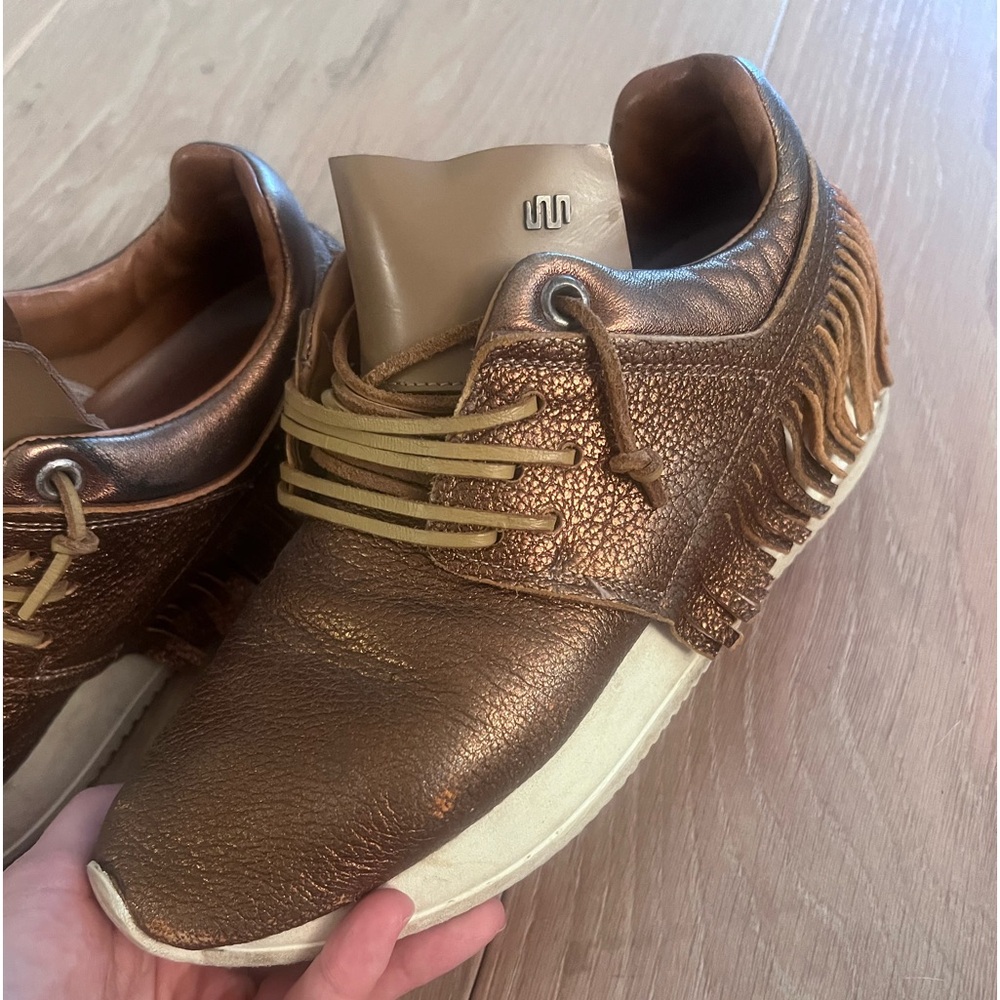 Esseutesse Gold Shine Leather Fringe Sneakers